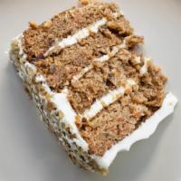 Truland Carrot Cake (Full Slice) · Great to share. Four monster layers, iced and layered with silky cream cheese icing, chopped...