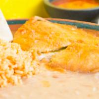 Chile Relleno (Cheese) Plate · Vegetarian. Served with rice, beans and homemade tortillas.