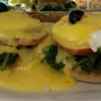 Crab Benedict · Fresh Northwest Dungeness Crab BenedictA grilled English muffin topped with fresh spinach, t...