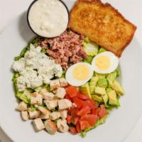 Cobb Salad · Grilled chicken breast, tomato, green onion, avocado, eggs, bacon crumbles, and Blue cheese ...