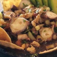 Molcajete De Mariscos · A mix of raw shrimp, shrimp marinated in lemon, octopus, sea scallops, and cooked shrimp. Se...