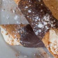 Cannoli · Italian pastries with sweetened ricotta cheese.