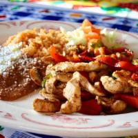 Chicken Carnitas · Chicken stripes cooked and mixed with onions, green bell pepper and tomato served with rice ...