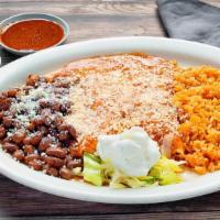 Chipotle Enchiladas · Our Special Chipotle Sauce topped with cotija cheese, sour cream. Served with rice and whole...