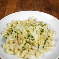 Haus Mac ‘N’ Cheese · White Cheddar, cavatappi pasta, herbs.