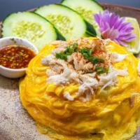 Crab Fried Rice · Fried rice with Blue Swimmer crab meat, egg, and scallions served with Thai spicy seafood sa...