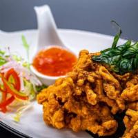 Taro & Corn Fritters · Deep fried battered taro and corn mixed served with sweet chili homemade dip