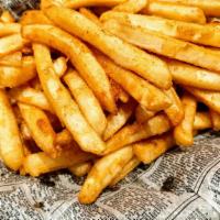 Basket Of Fries · Large portion of Golden brown seasoned russet potato french fries.  Choose regular or curly ...