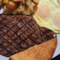 Ny Steak And Eggs · A half pound of NY Rib Eye steak flame grilled to order with 3 large eggs cooked your way.  ...