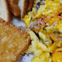 Country Scramble · 3 scrambled eggs with ham, mushrooms, onions and your choice of cheese.  Served with your ch...