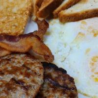 Breakfast 2 Egg Combo · 2 eggs cooked your way, 2 strips of bacon or 2 patties of sausage, 2 slices of toast (choice...