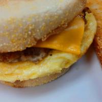 Sausage And Egg Sandwich · Toasted English muffin with a sausage patty, scrambled eggs and your choice of cheese served...