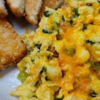 Veggie Scramble · 3 eggs scrambled with spinach, onions, tomatoes, bell peppers and your choice of cheese, cho...