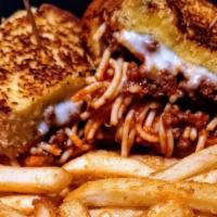 Spaghetti Sandwich · Homemade spaghetti with beef topped with mozzarella cheese and served on garlic toasted Texa...