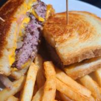 Patty Melt · Grilled sourdough bread surrounding a half pound of flame grilled beef with cheese and caram...