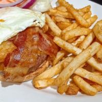 Hearty Beef Burger Meal · This flame grilled half pound beef burger is a feast in itself.   Topped with slices of baco...