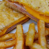 Grilled Ham And Cheese Sandwich · Traditional grilled ham and cheese sandwich.  Your choice of cheese and choice of bread.  Se...