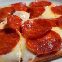Pepperoni Pizza · Personal seven inch pizza topped with our pizza sauce and covered in pepperoni slices with y...