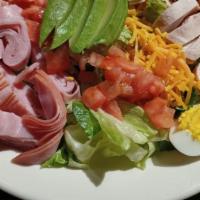 Cobb Salad · Fresh garden salad made with iceburg lettuce and layered with chopped tomatoes, bacon, ham, ...