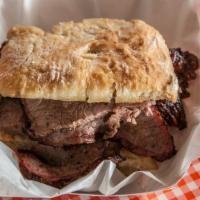 Beef Tri Tip Sandwich · Delicious tri tip roast and house sauce, served on a po boy roll.