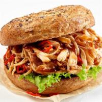 Pulled Chicken Slider · Delicious marinated pulled chicken on a bun.