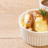Mashed & Gravy  · Fresh cooked potatoes mashed with butter and real brown gravy.