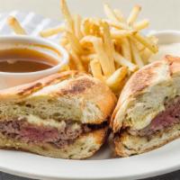 Prime French Dip* · 1550/1070cals. Warm roast beef, au jus, sharp white cheddar cheese, toasted parmesan baguette.