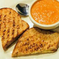 Grilled Cheese & Soup · white cheddar cheese with tomato basil soup
(580 calories)