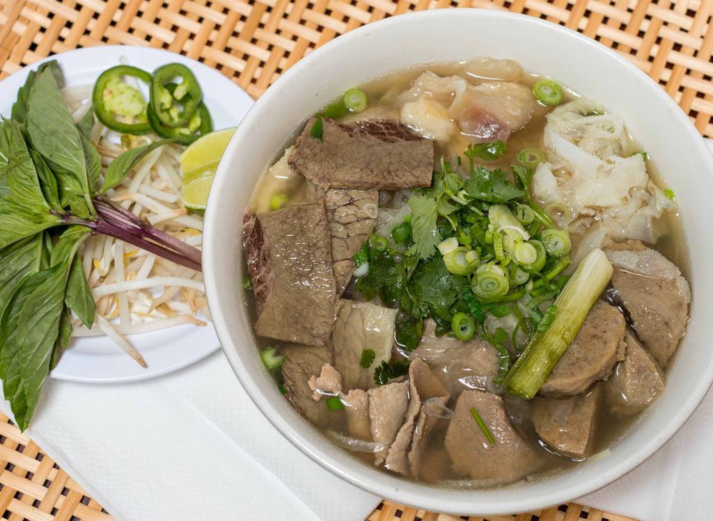 Combination Pho /  Pho Dac Biet · Fresh Sliced Beef, Beef Ball, Brisket, Tendon, Tripe.

Consuming raw or undercooked meats, seafood, poultry or eggs may increase your risk of foodborne illness, especially if you have medical conditions.