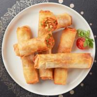 Spring Roll · (2 pieces) Soft rice paper wrap with shrimp, chicken, rice noodles, and vegetables. Served w...