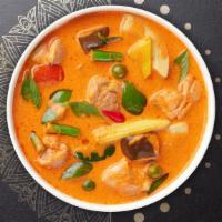Panang Curry · Coconut milk red curry with green beans, bell pepper, and basil.