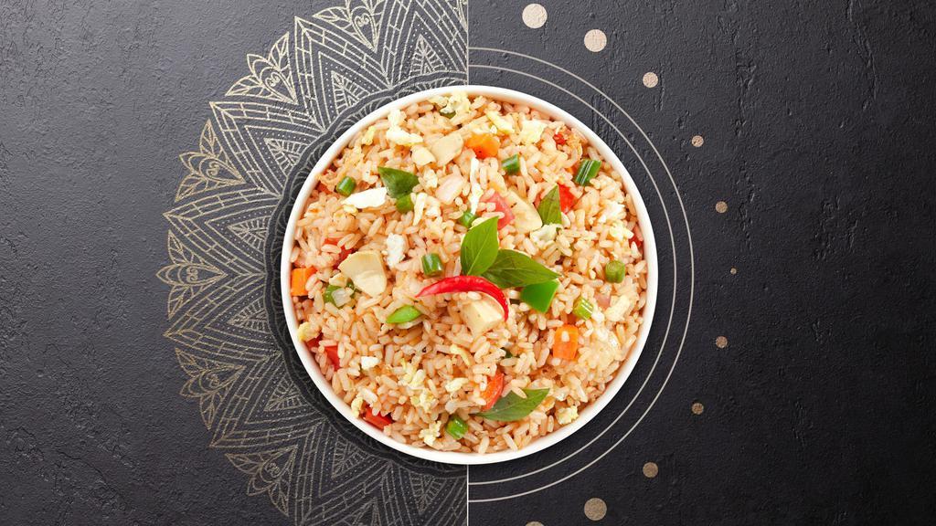 Basil Fried Rice · Fried rice with green bean, bell pepper basil, and fried egg.