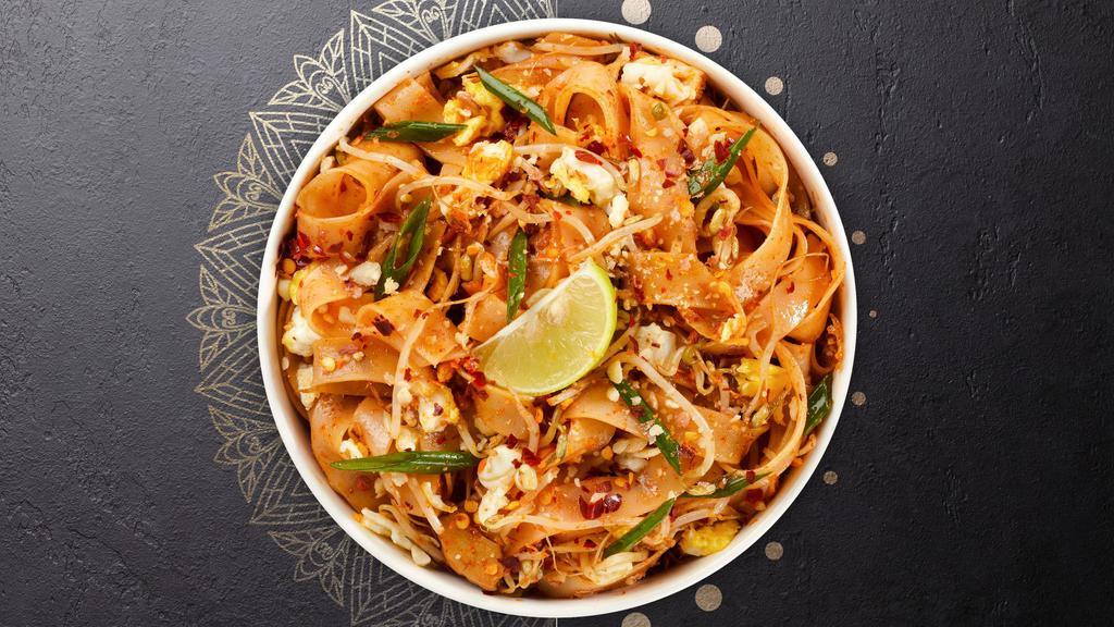 Pad Thai Noodle · Rice noodles fried with eggs, bean sprouts, ground peanuts, and green onion on top.