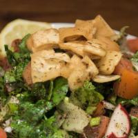 Fattoush Salad · Romaine lettuce, tomatoes, cucumbers. onions, mint, sumac, parsley and fried pita, with fres...