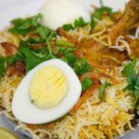 Chicken Dum Biryani · Bone-in Chicken cooked with basmati rice, flavored with saffron and aromatic spices. served ...