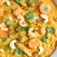 Navrathan Korma · Fresh vegetables simmered in a creamy Indian korma sauce
