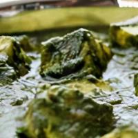 Saag Paneer · Fresh spinach soaked in pure spinach gravy