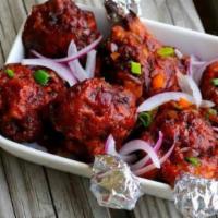Chicken Lollipop · Chicken wings marinated in homemade spices coated in batter & deep fried