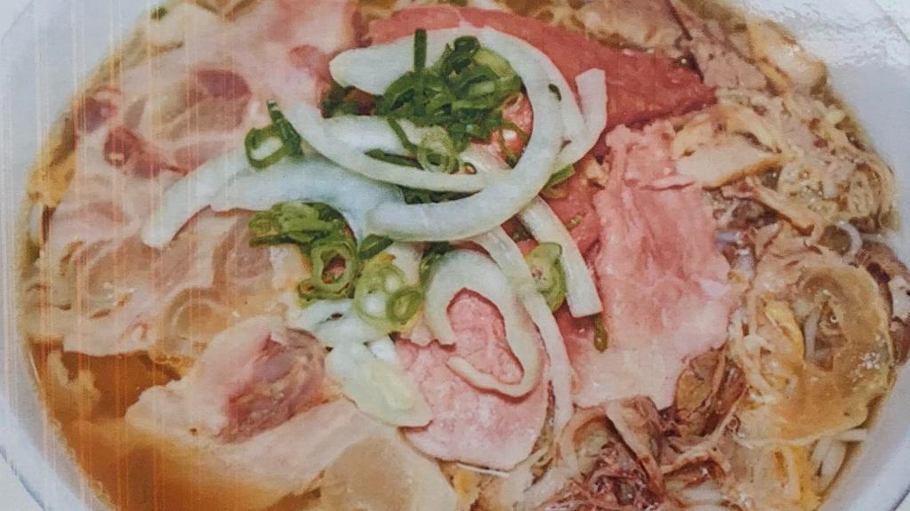 Phở Eye Of Round Steak, Well Done Flank, & Soft Tendon · Choose your own vegetable toppings
