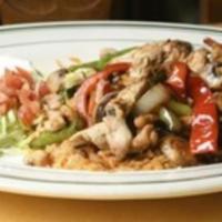 Steak Carnitas · Sirloin steak slices with bell peppers, onions, tomatoes, and cilantro. Served with rice, be...