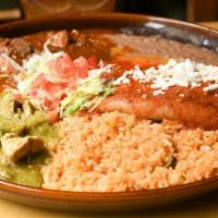 Los Tres Amigos · Chile verde, chile colorado, and an authentic chile poblano relleno. Served with rice and be...