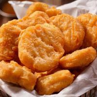 Kids Chicken Nuggets · Five chicken nuggets, fries and beans or French fries.