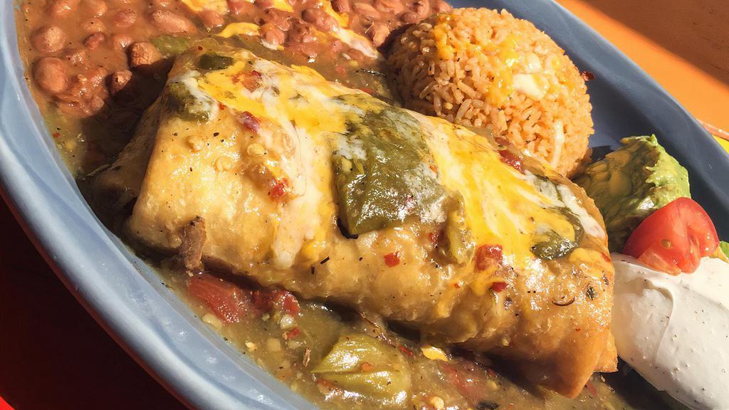 Chimichanga · Your choice of one of the following deep-fried burros topped with our homemade new Mexico red or green chile, topped with cheese, side of guacamole and sour cream.