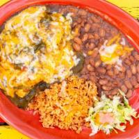 Chile Relleno · Spicy whole new Mexico green chile wrapped in an egg batter stuffed with cheese, smothered i...