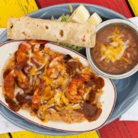 Shrimp Veracruz · Spicy large shrimp in new Mexico red chile topped with cheese served over rice with beans an...