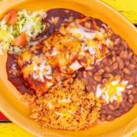 Garlic Pork Roast Burrito · Spicy. Slow cooked in a dutch oven topped with New Mexico red or green chile, and topped wit...