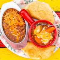 New Mexico Green Chile Stew · Spicy. Slow cooked pork, potatoes, and carrots in spicy New Mexico green chile, topped with ...