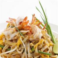 Pad Thai · Stir-fried noodles in tamarind sauce with bean sprouts, scallions, crushed peanuts and egg (...