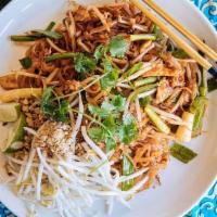 Kid Pad Thai · PAD THAI CHICKEN OR TOFU 
Stir-fried noodles in tamarind sauce with bean sprouts, scallions,...