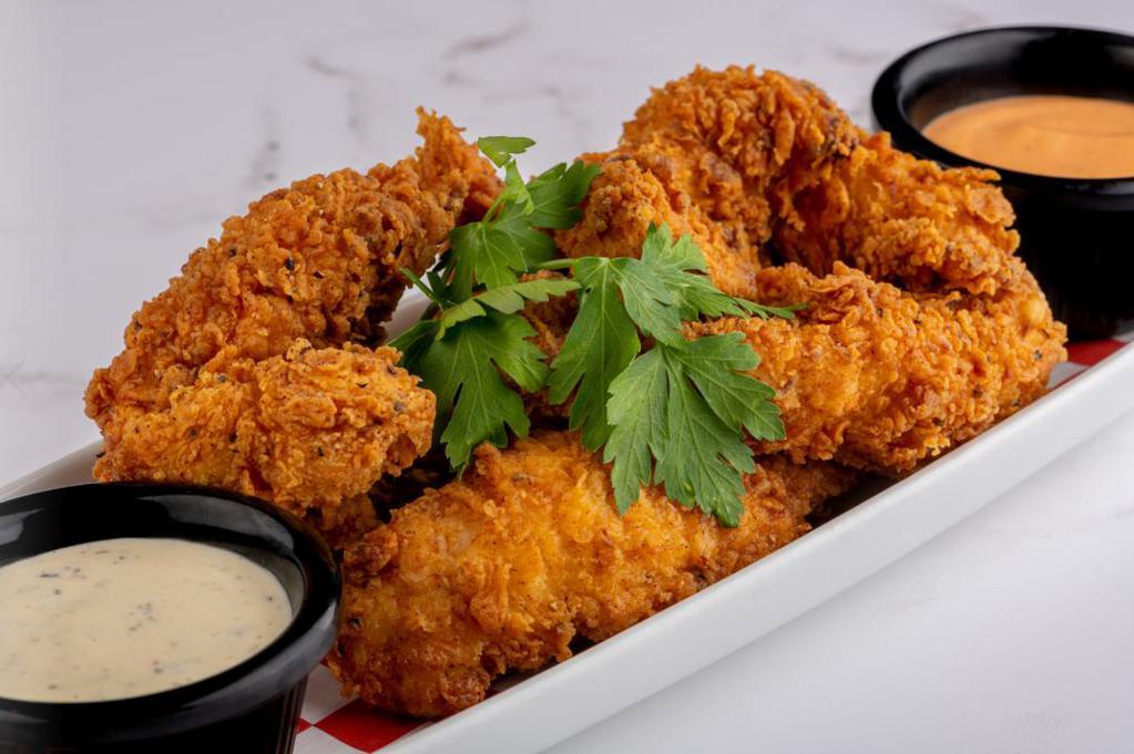 Hand Breaded Chicken Tenderloins · Six hand breaded chicken tenderloins, dipped in seasoned batter and fried to perfection. Served with Newcastle BBQ Sauce and Peppercorn Ranch.